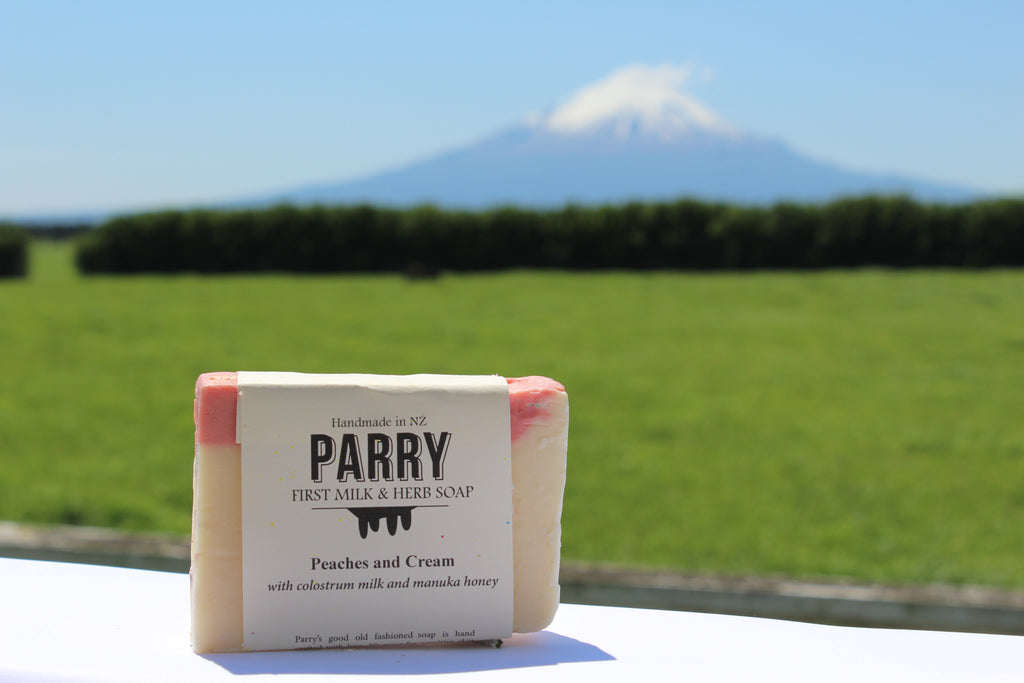 Peaches & Cream by Parry Soap Co - This beauty bar has a peach orange-floral scent with fresh greenery notes and musk undertones and has universal appeal. Very popular as a gift. Very popular in the markets. Great for dry and sensitive skin. 